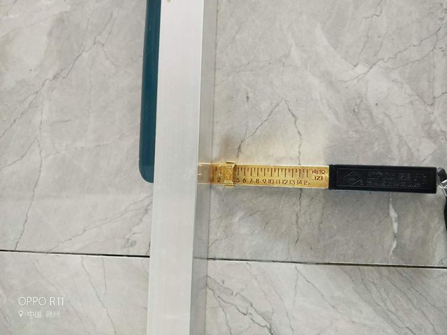 8地磚鋪貼完后檢測瓷磚縫隙是否均勻，平整度縫隙是否合格.jpg